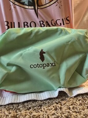 Cotopaxi Nido  Mint Green Packable Travel Pouch with Logo